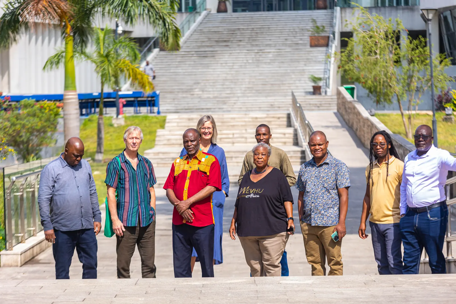 Delegates of PAWS 2025 gathered on the steps of the University of Dar es Salaam Library